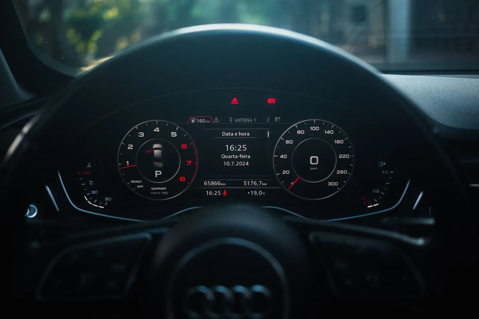 Dynamic shot of a modern car dashboard featuring a digital display and sleek design.